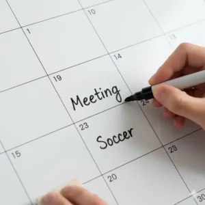 Writing on and cleanly erasing the smooth surface of the 24 x 36 dry erase calendar board to show non-ghosting quality.