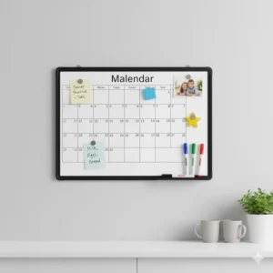 Magnetic whiteboard 36 x 24 calendar being used for family organization with notes and photos attached.
