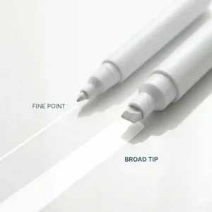 Comparison of line widths between a fine point and a broad tip white dry erase marker.