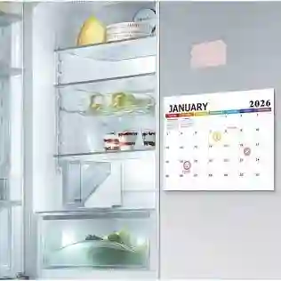 "A modern monthly planner style magnetic refrigerator calendar attached to a white kitchen fridge showing schedule details."calendars magnetic refrigerator